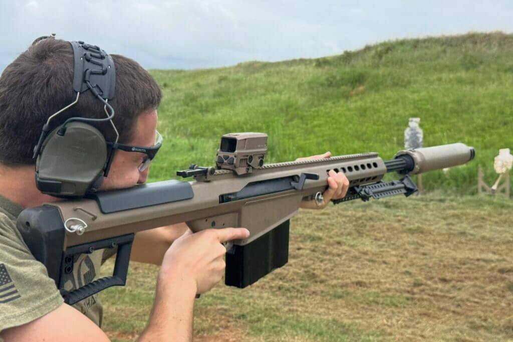 ComTac VIII 3M PELTOR headset left cup showing boom microphone and slim cup design for rifle cheek weld