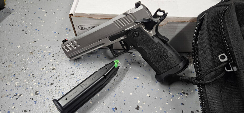 Left side profile of Bersa M2XI 9mm 2011 showing tapering slide, front and rear serrations