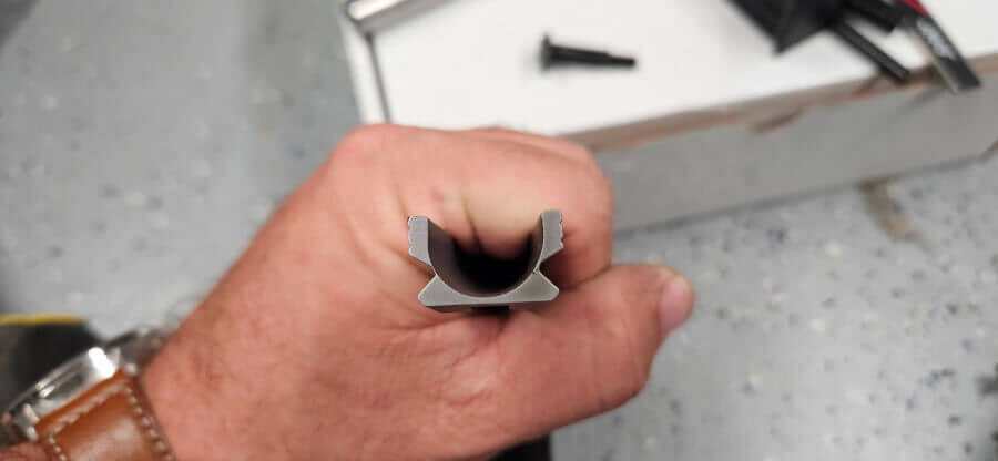 Picatinny rail on Bersa M2XI stainless frame showing deep side cuts