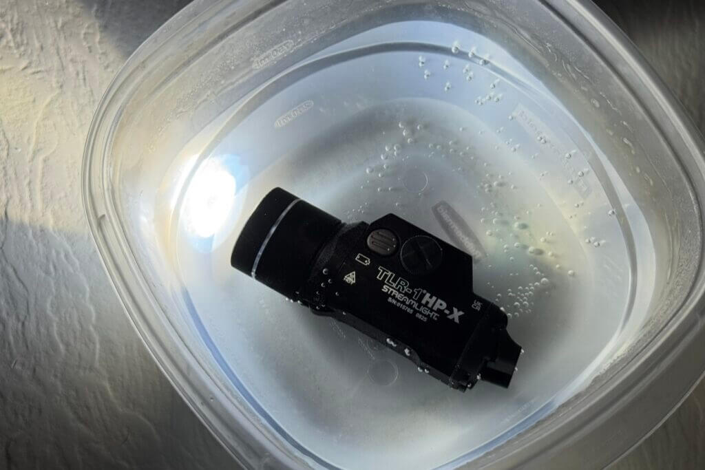 TLR-1 HP-X submerged in ice water while illuminated during test