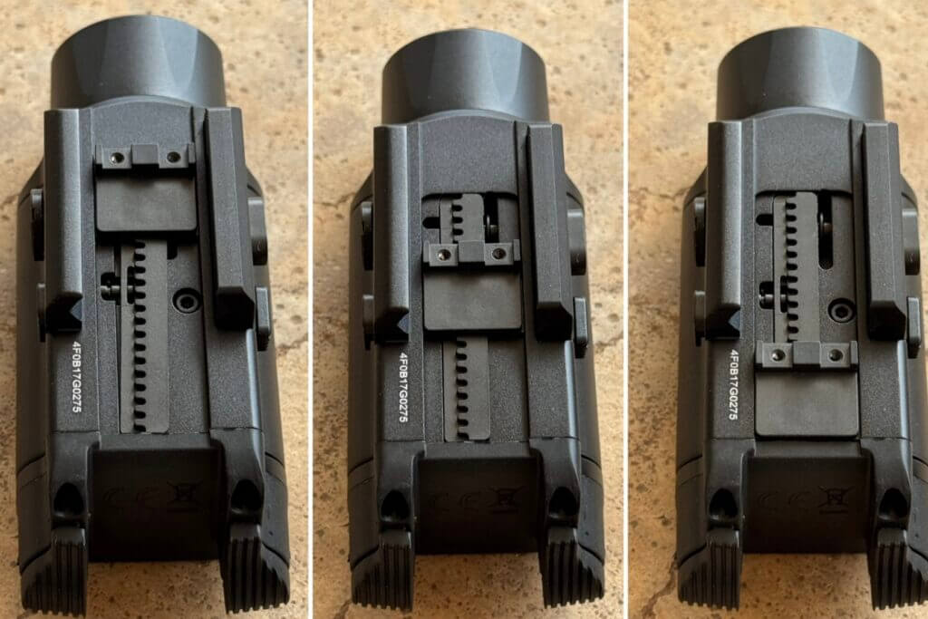 Close-up of the Nitecore NPL35 sliding rail stopper mounting system on a pistol light