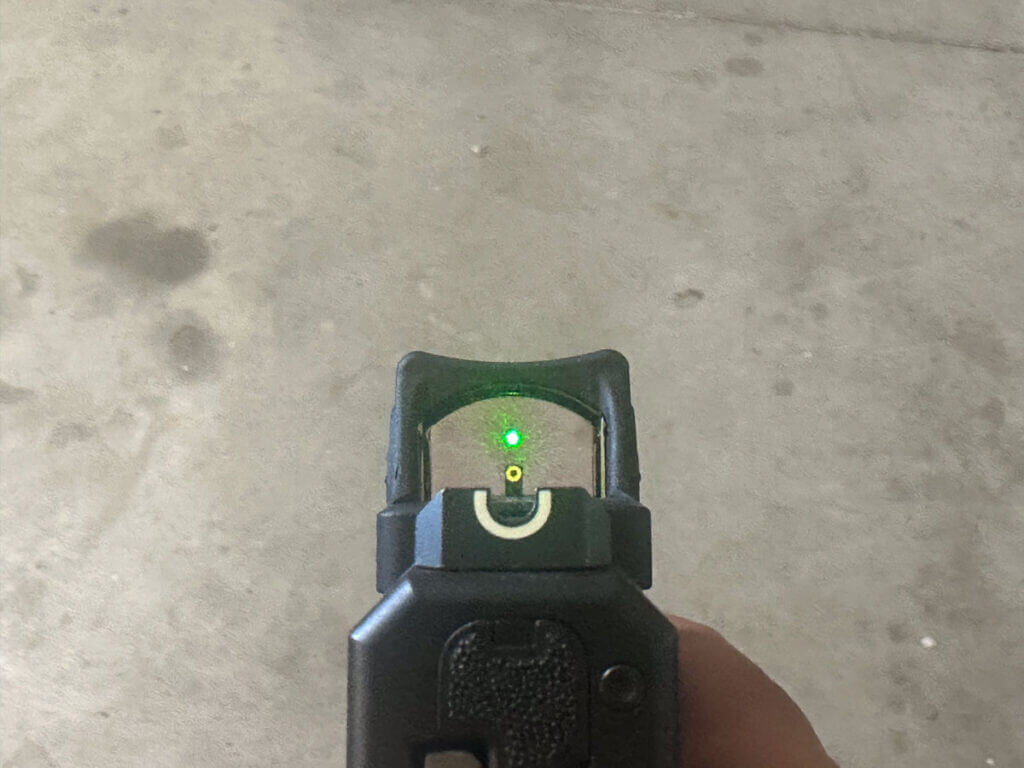 looking down at green dot