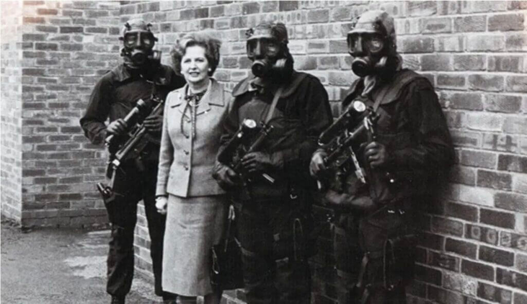 women with men in masks. London