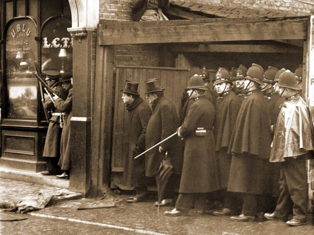 men in coats in london