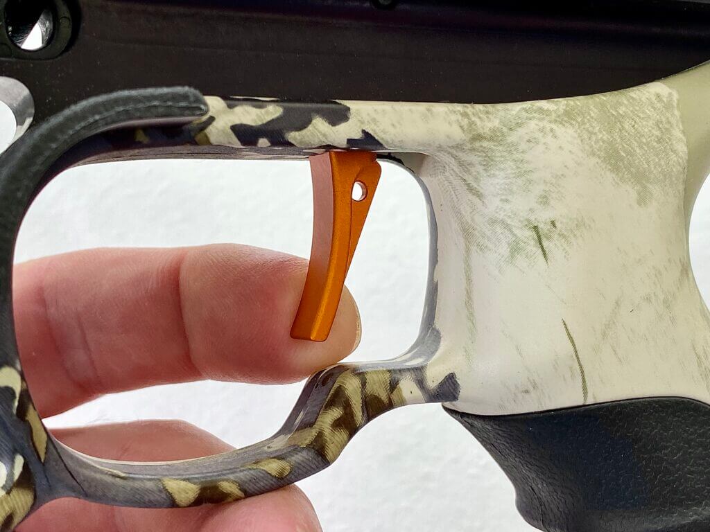 Close view of Ravin R470 trigger that feels like a rifle trigger