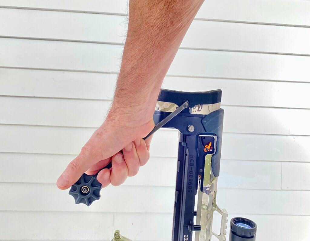 Ravin R470 Versa Draw cocking handle inserted in stock attachment point