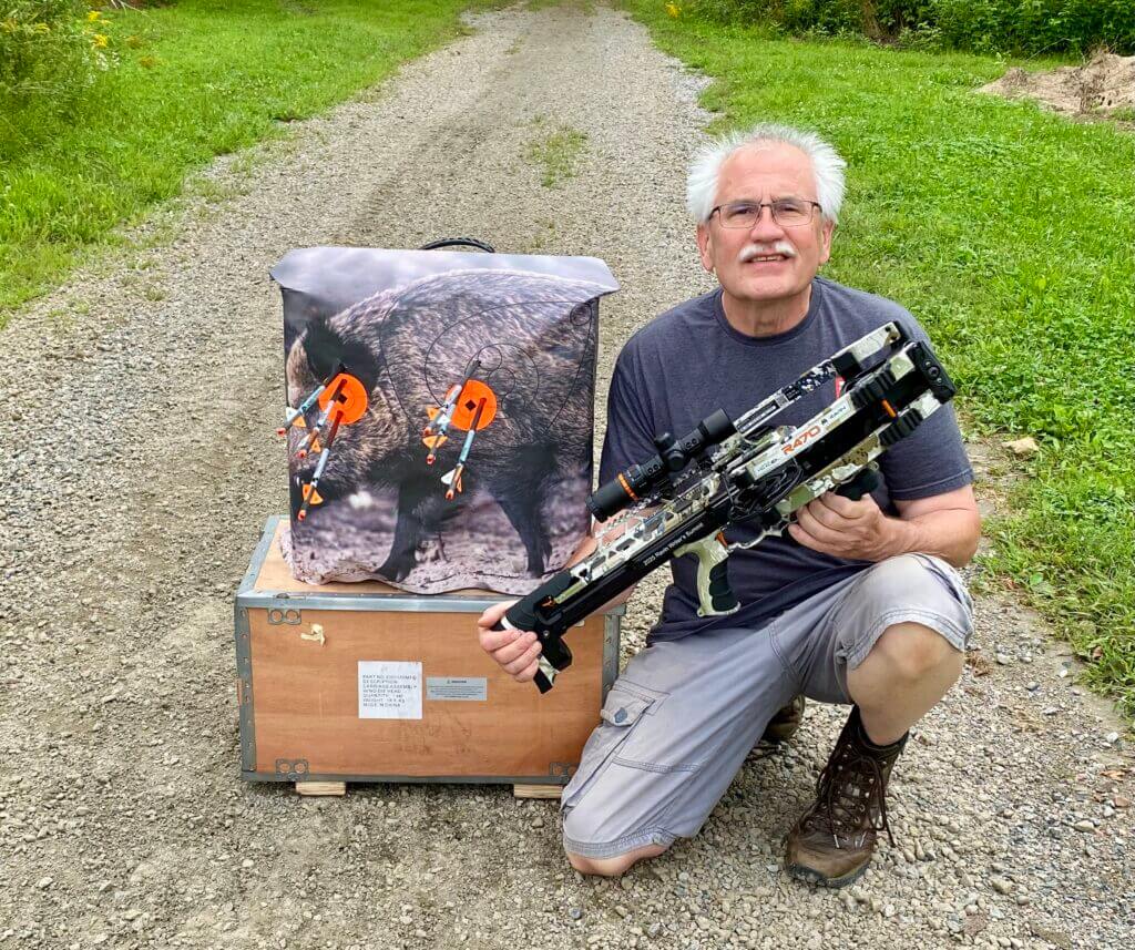 Targets showing 50 yard rested group and 30 yard offhand group with Ravin R470