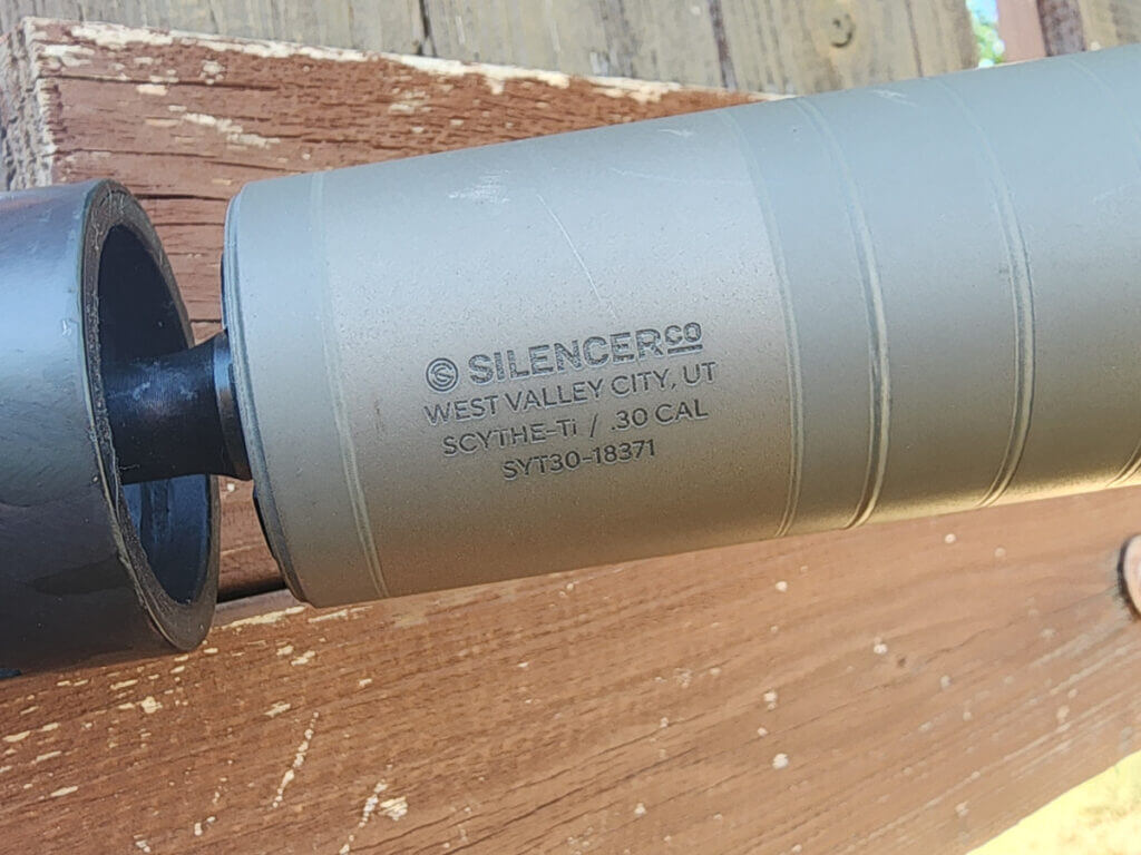 SilencerCo Scythe Ti titanium rifle suppressor on bolt gun, lightweight multi-caliber can for hunting and long range