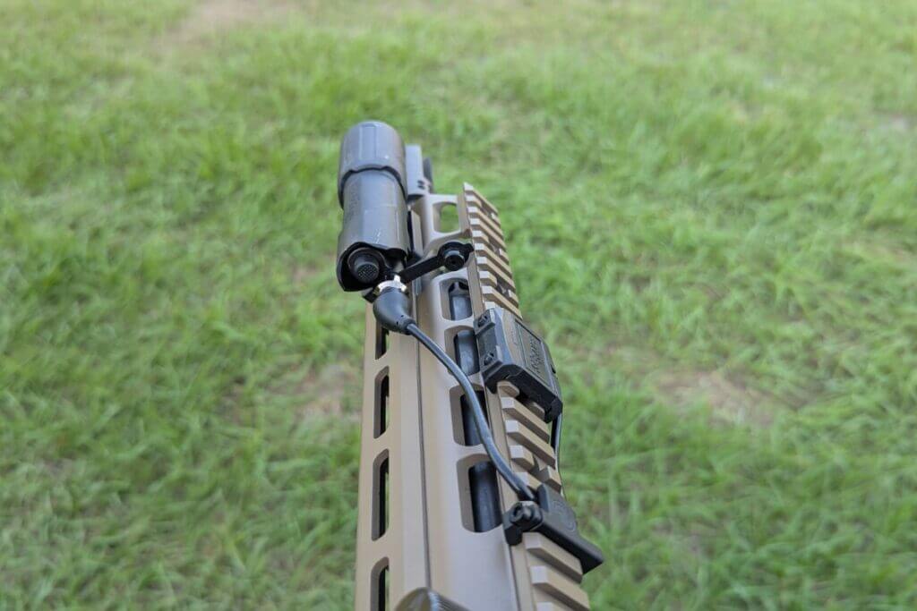 M-LOK handguard with rifle light mounted forward to minimize barrel shadow