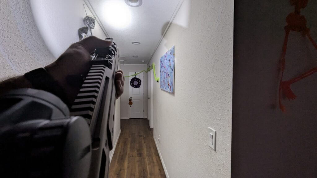 umbrella method weapon light pointed at ceiling to diffuse light