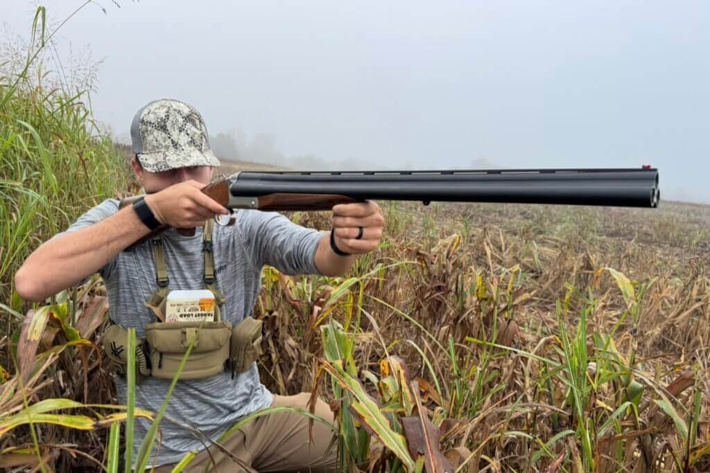 man with shotgun
