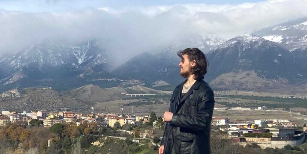 Michael Gloss traveling and engaging with causes before leaving the United States for Russia