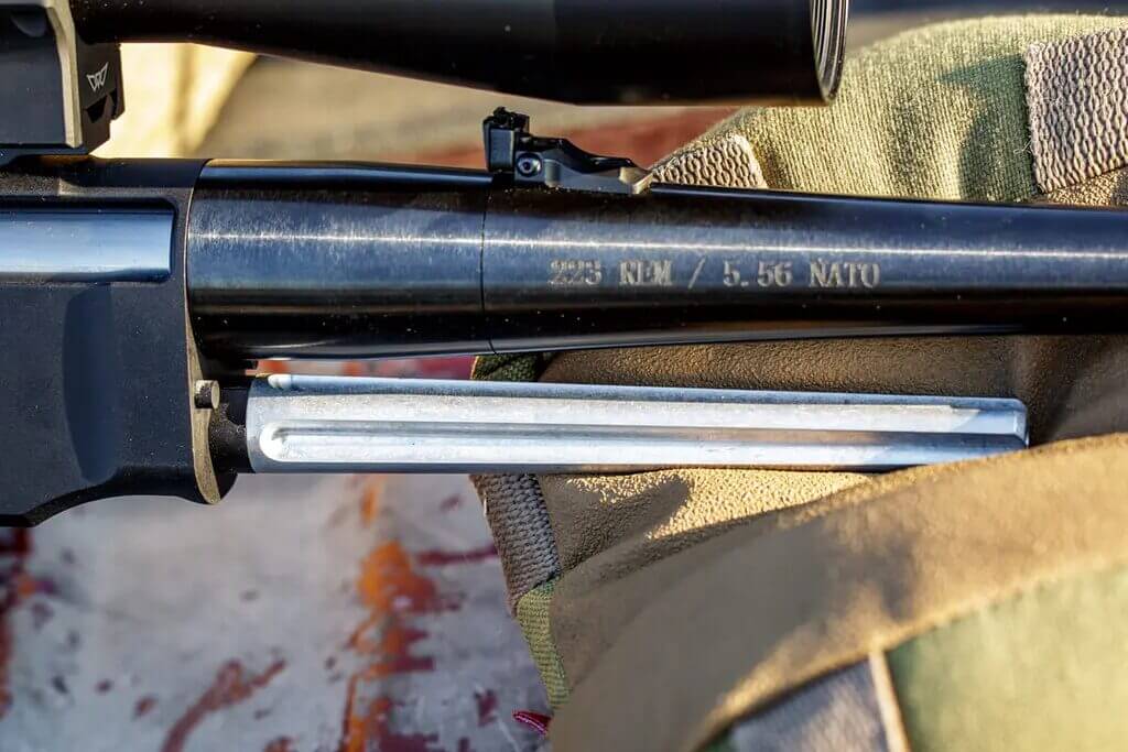 Henry Lever Action Supreme forend stud tying the walnut forend to the receiver for rigidity