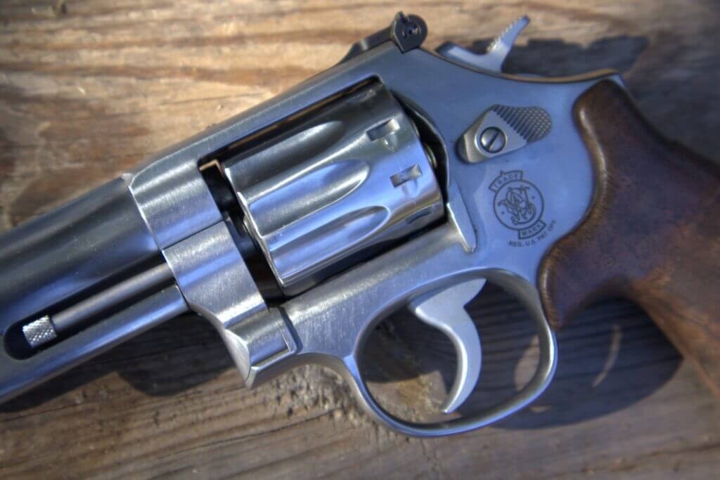 S&W 617 Mountain Gun cylinder, ejector rod, K-frame crane lockup, and no-lock sideplate detail