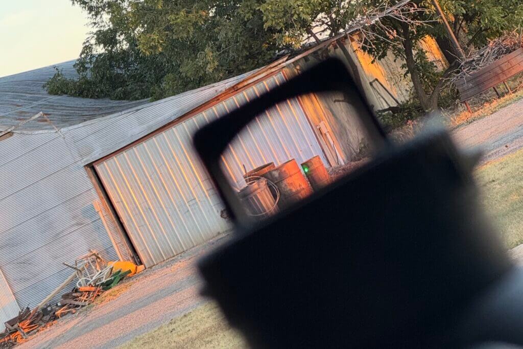Lower profile elevation turret on the Razor 4-24x44 with Defender-XL red dot mounted at 12 o'clock