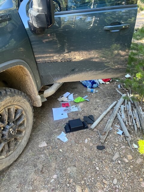 Close view of chewed dash and torn door seals on 2025 Silverado after bear intrusion