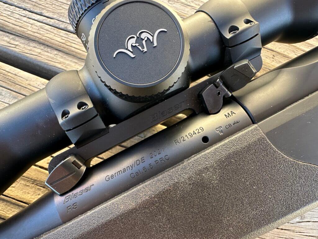 Blaser QD Saddle Mount attached with one lever open to show mechanism