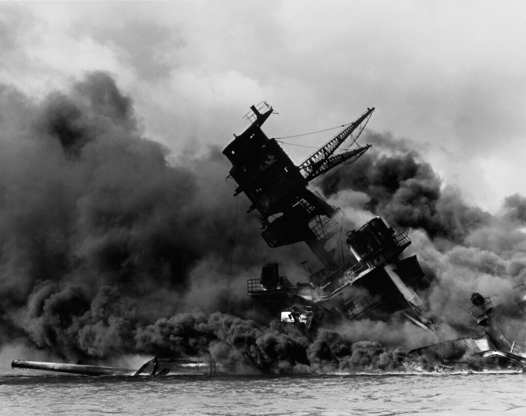 USS Arizona burning at Pearl Harbor during World War 2 attack