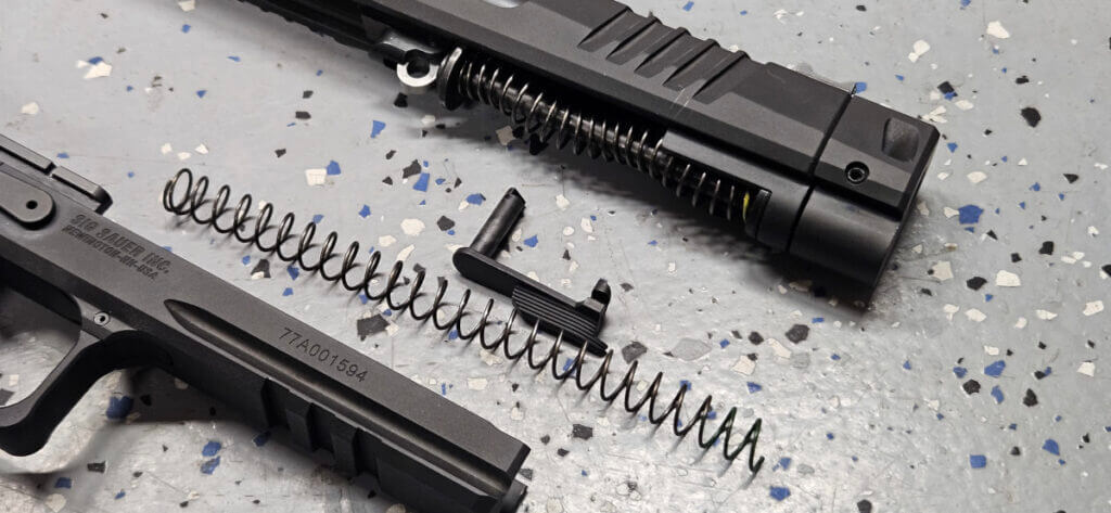 Two color coded recoil springs included with Sig P211 GTO for tuning 9mm loads