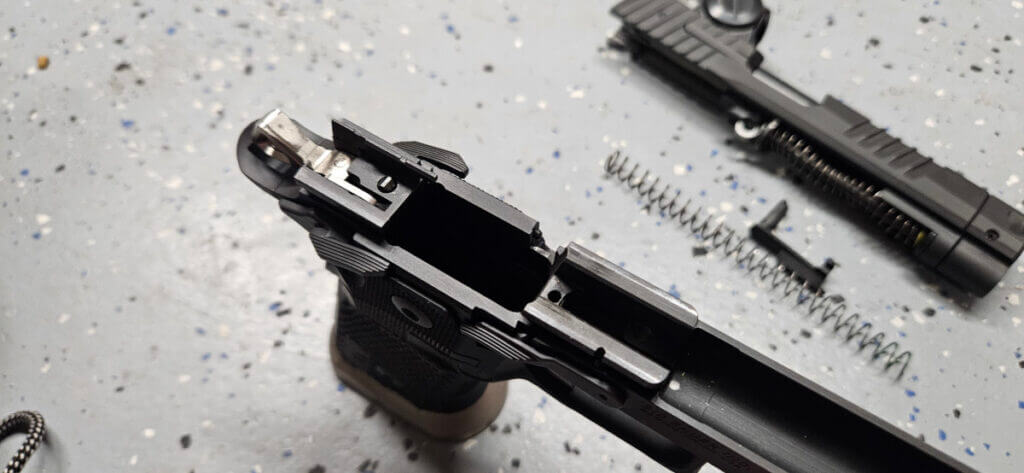 Internal view of Sig P211 GTO showing extended ejector and series 80 style safety components