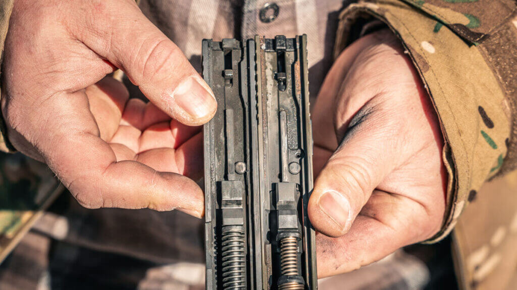 SAR9 SOCOM internals beside Glock 19 Gen 3 for comparison