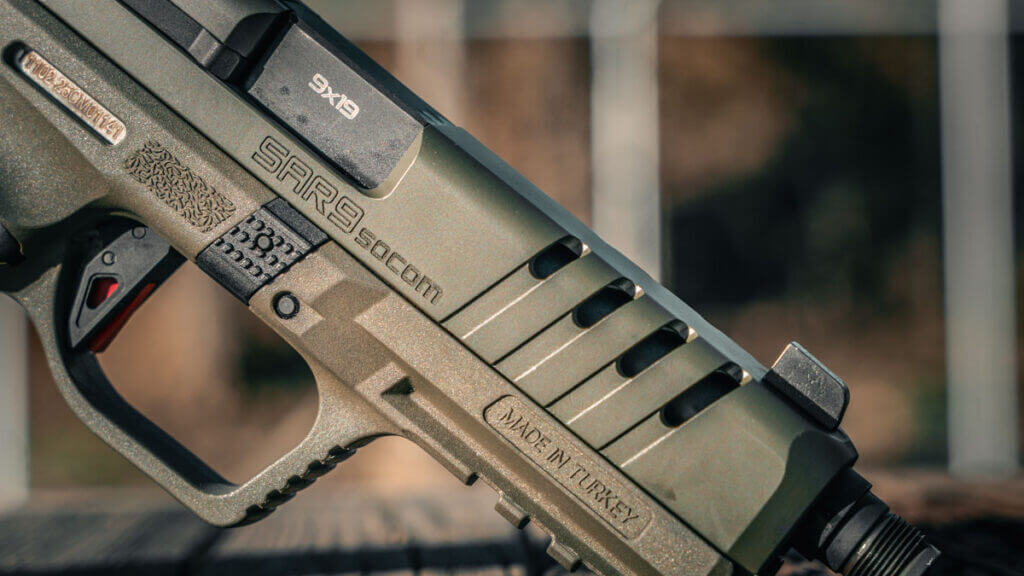 SAR9 SOCOM on the range with optic and threaded barrel