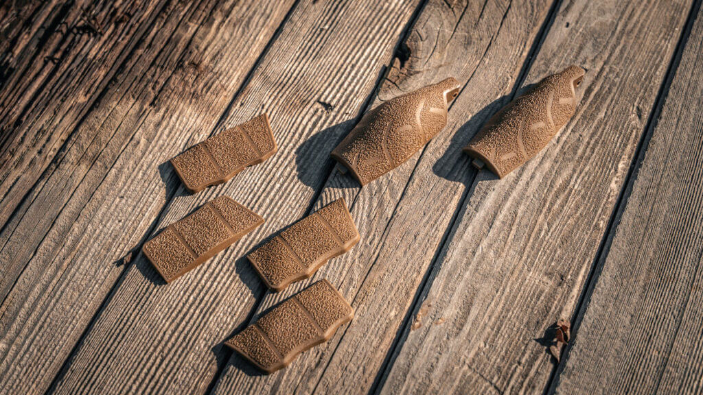 Interchangeable backstraps and grip panels for SAR9 SOCOM customization