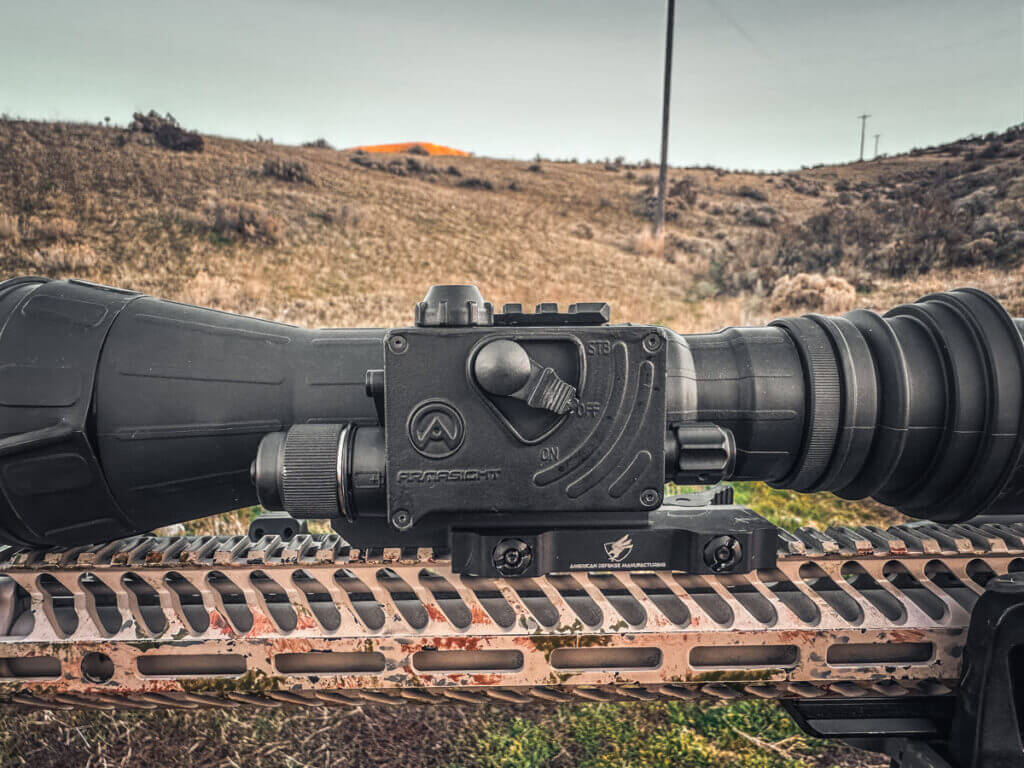 Armasight CO-LR power switch showing on off and standby positions