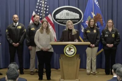 Pam Bondi at a press conference.