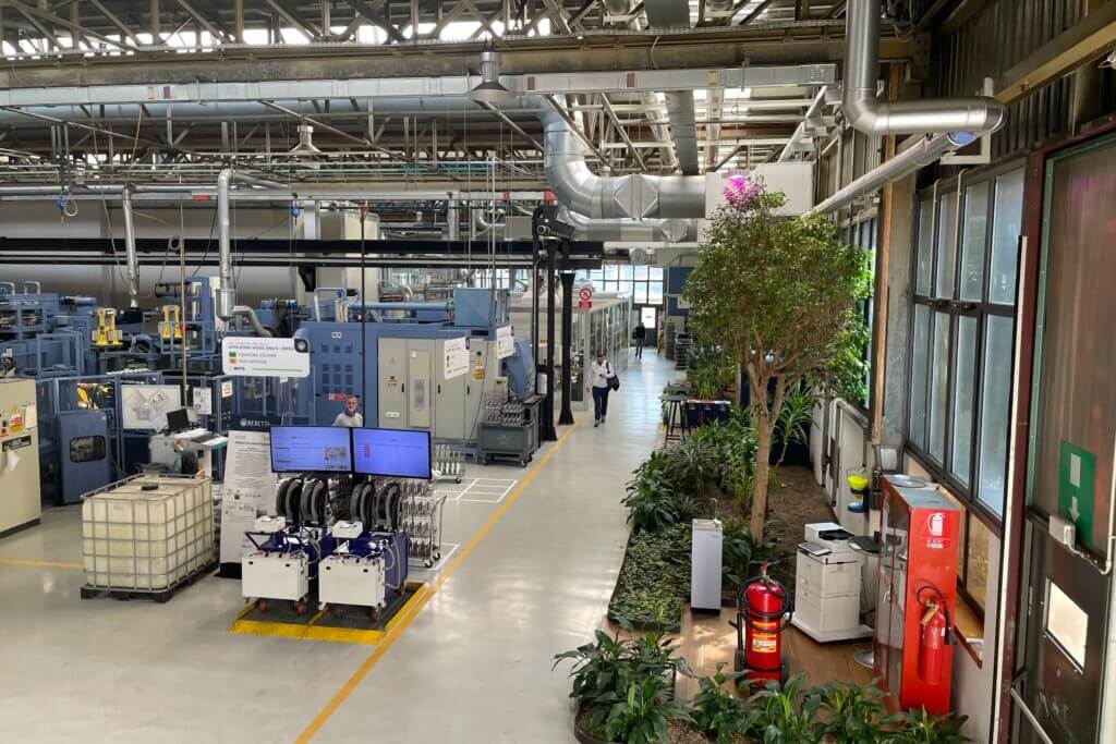 Greenery and trees inside Beretta production areas showing clean factory environment