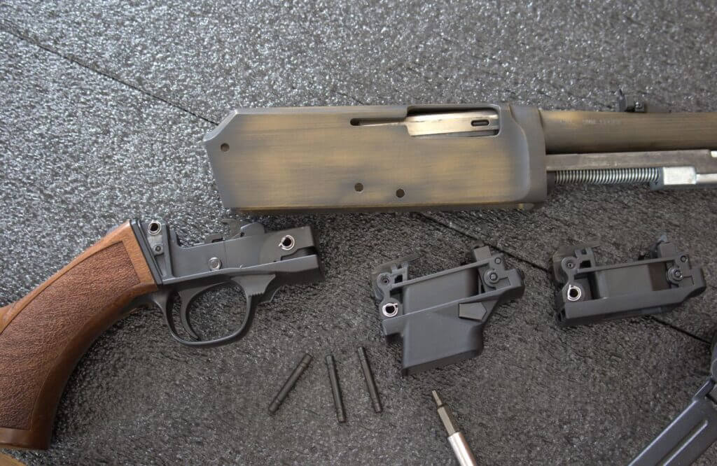 Henry Homesteader M-LOK disassembled with both magazine wells shown for factory and Glock magazine use