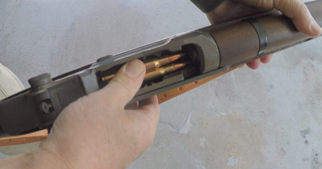 How to load an M1 Garand with the bolt locked back and clip pressed into the magazine