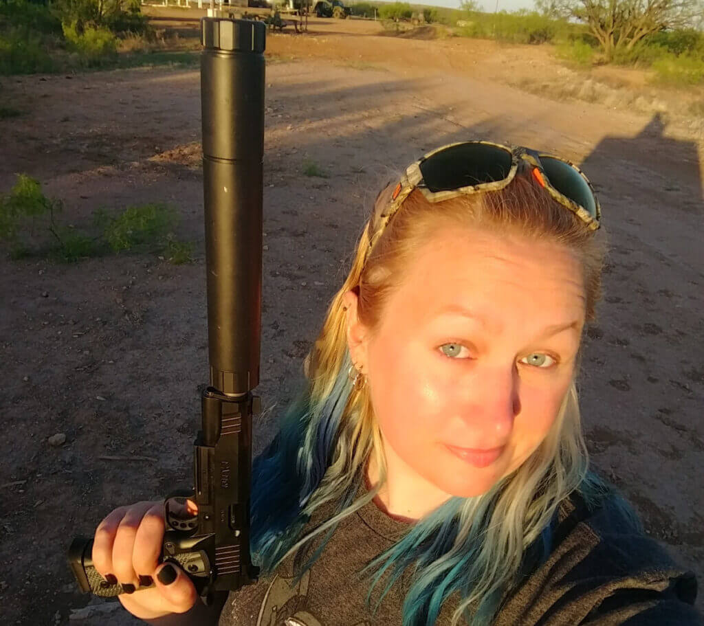 Full length pistol suppressor shown on a handgun demonstrating size tradeoffs