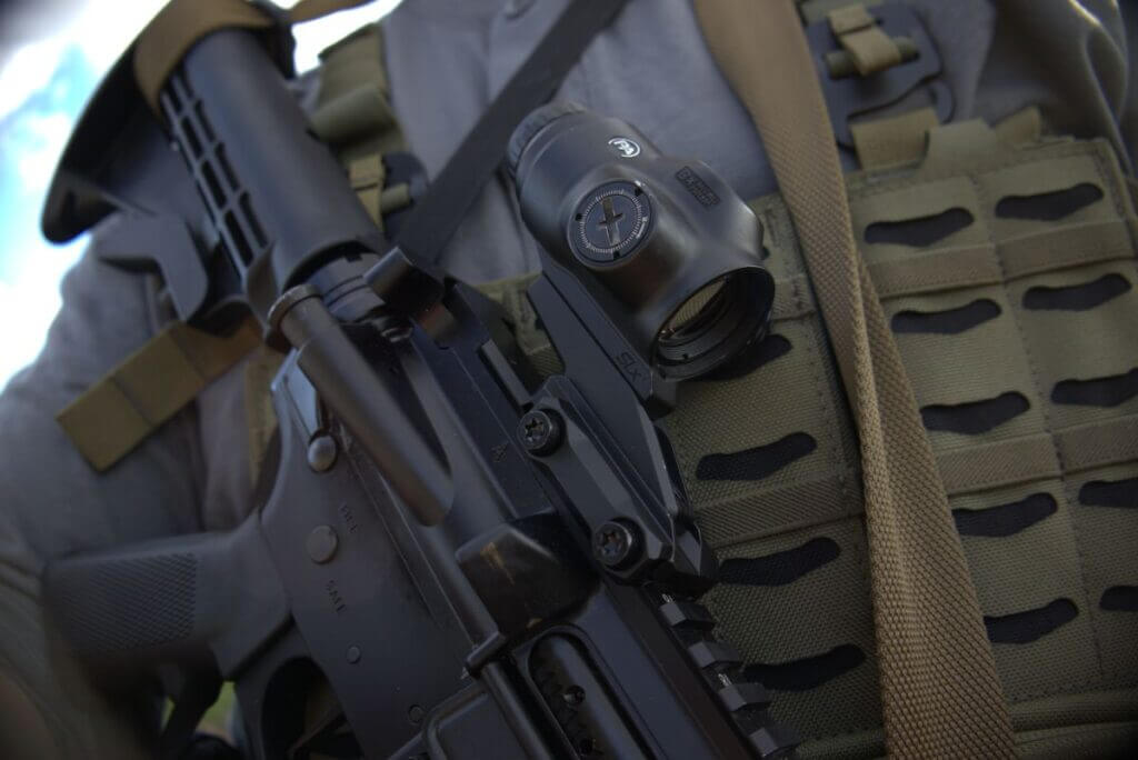 primary arms slx optic mounted on an ar-15 rifle