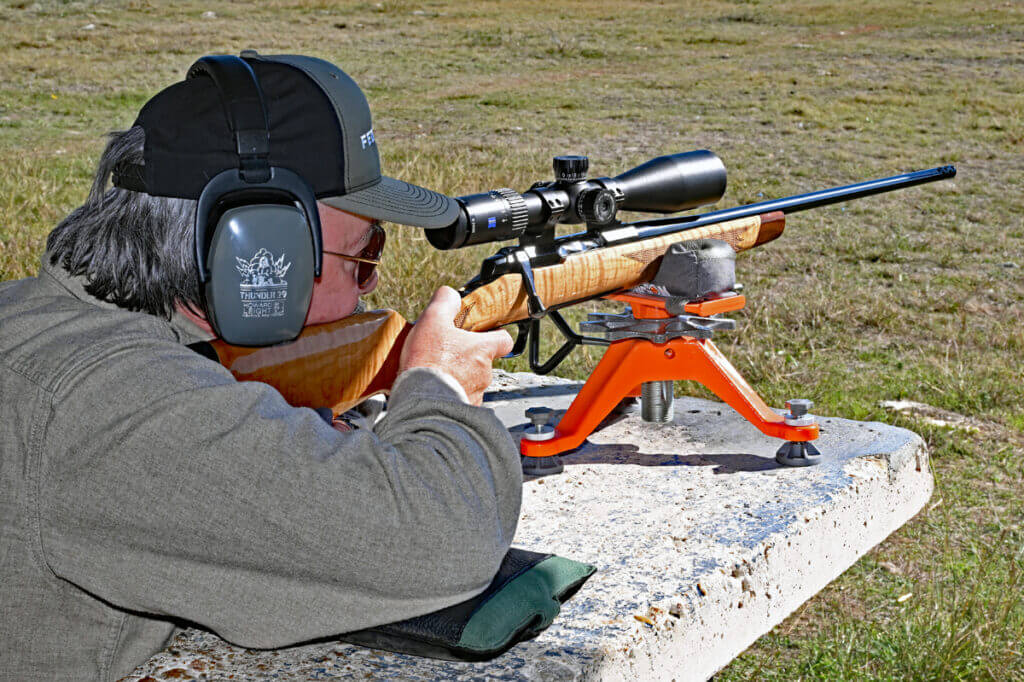 Author test firing Browning X-Bolt 2 Medallion Maple at the range during accuracy testing