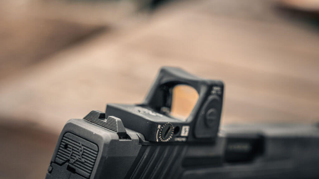 Taurus TX9 optics ready slide with mounted Trijicon RMR