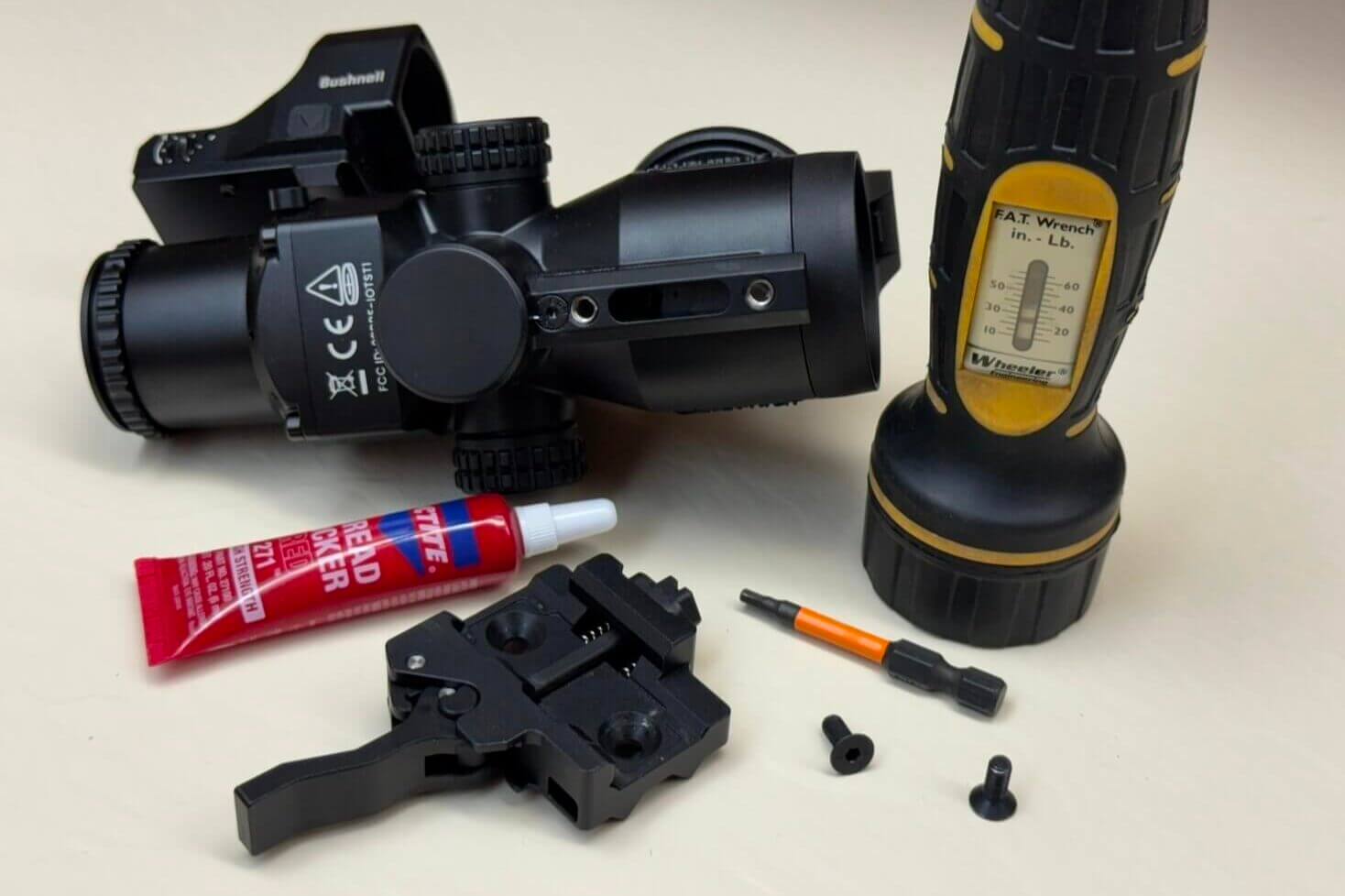 Applying blue Loctite and torquing the IOL25 mount screws to specification