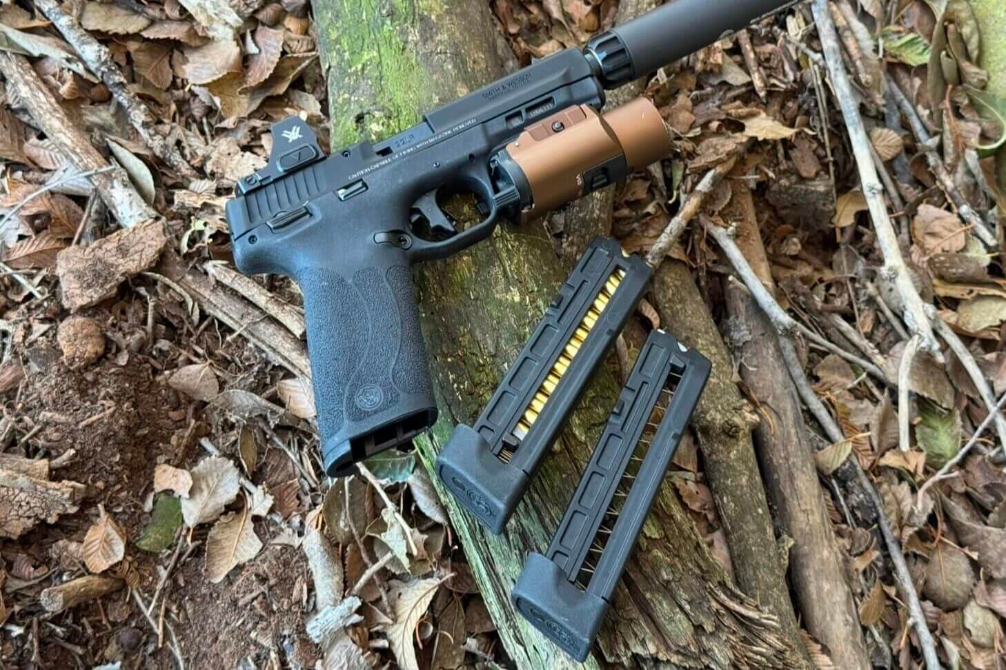 Two M&P22X 20 round magazines with witness slots showing round count