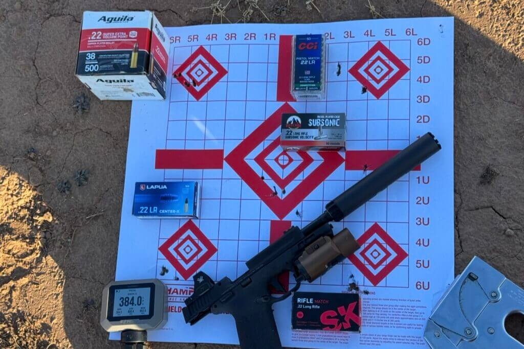 Five round groups at 10 yards from the M&P22X displayed on target