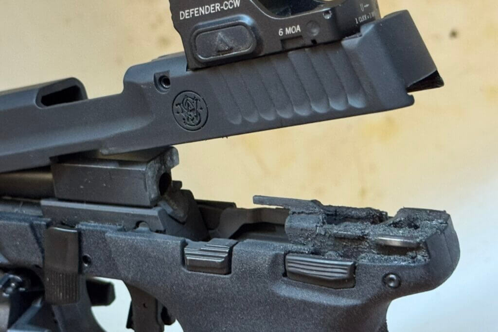 Closeup showing carbon and fouling buildup on M&P22X after 250 suppressed rounds