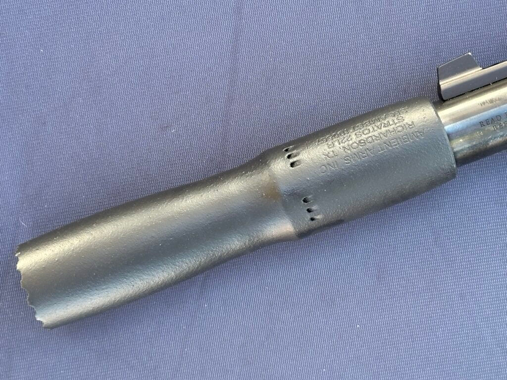 Side profile of the Stratos .22 and view of the intake ports on the back 1/3rd of the suppressor.