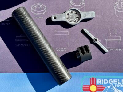 The Ridgeline Suppressors Hush, brake, endcap tool, and brake timing tool are all arranged in view on a tabletop.
