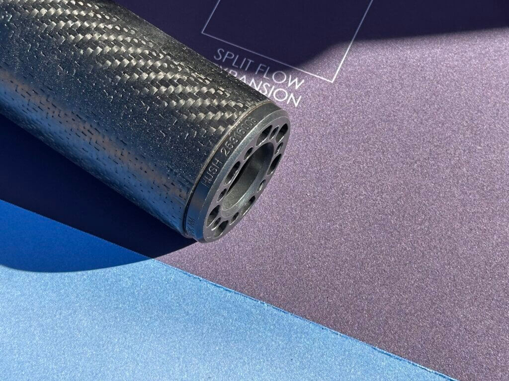 A close up view of the suppressor shows the serialized part of the Hush.