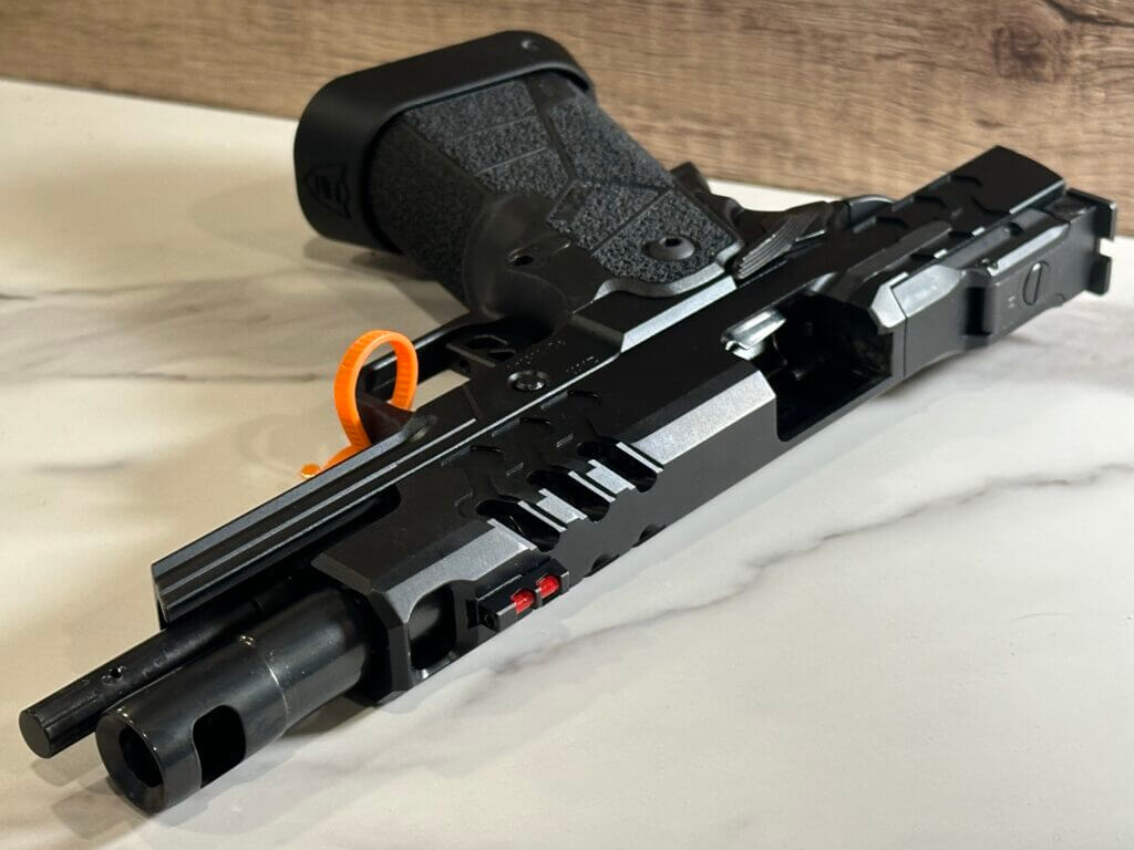 A closeup look at the port in the barrel and slide of the Kimber 2K11 Comp.