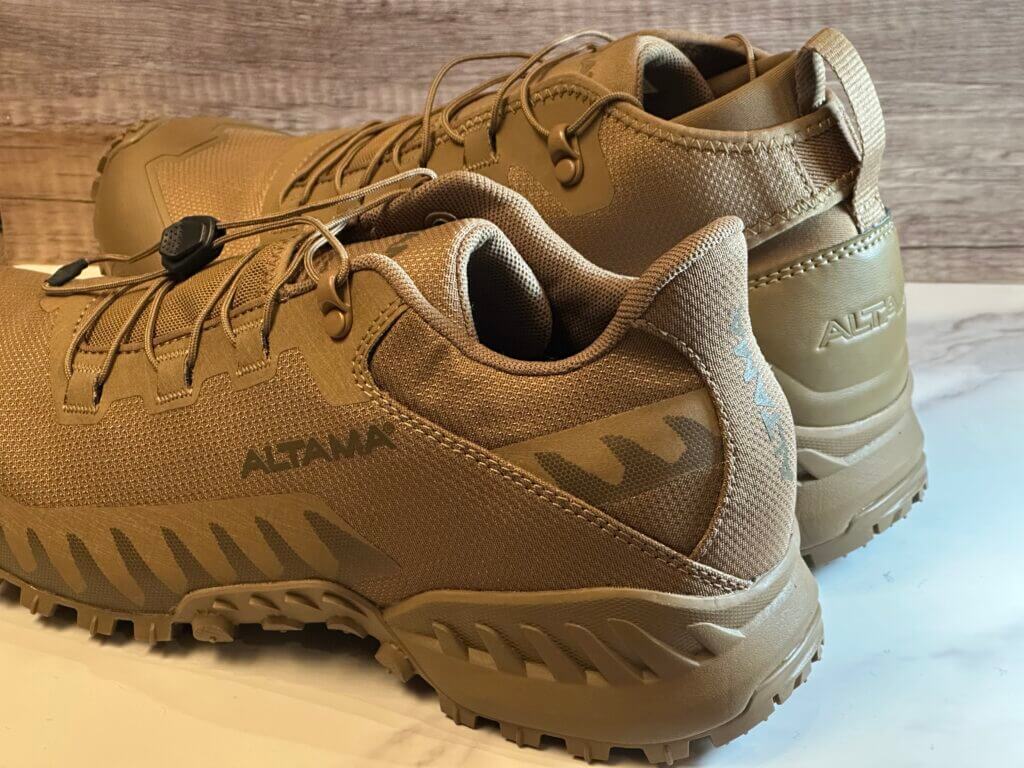 Two different height shoes are set next to eachother to compare them.