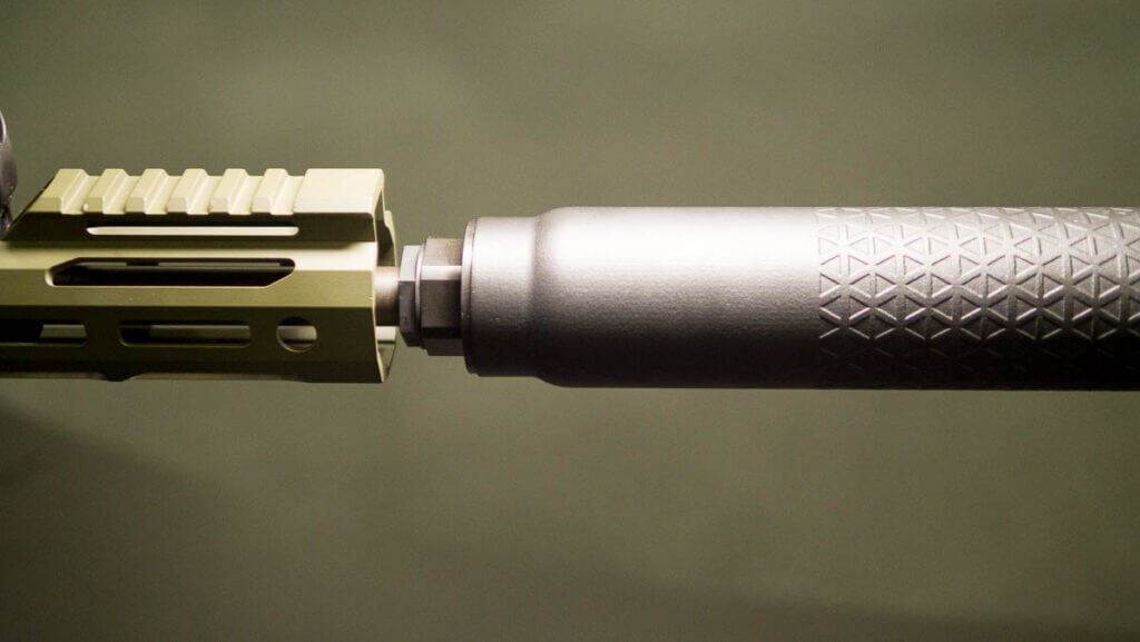 Freedom Fighter AK muzzle with Cherry Bomb brake and QD suppressor adapter installed