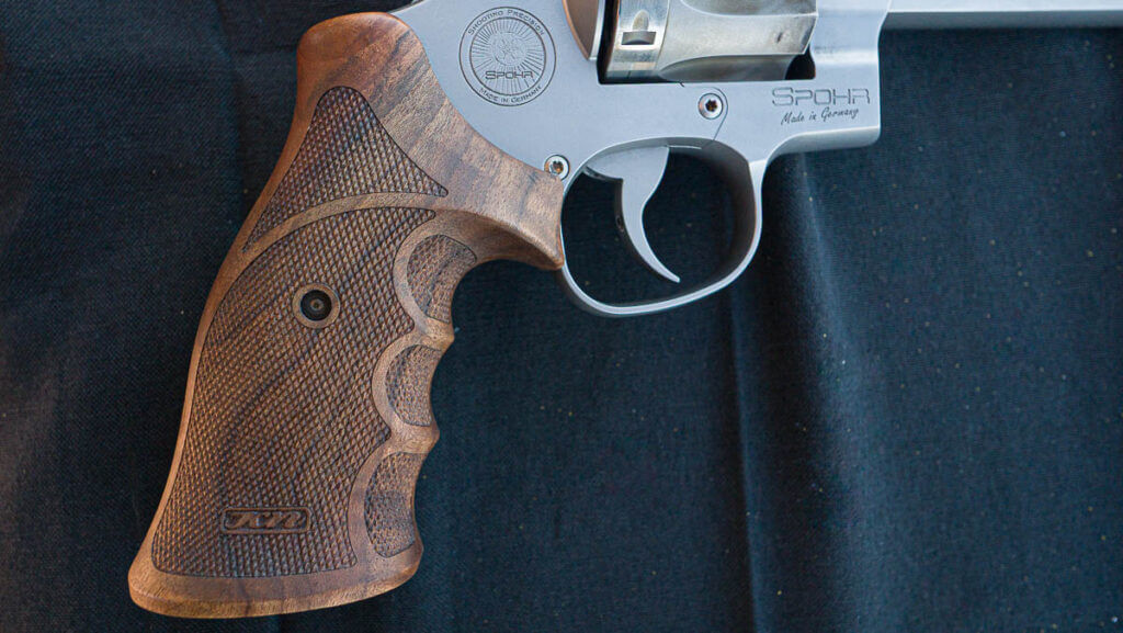 Close up view of the right side of the Karl Nill-designed walnut grips.
