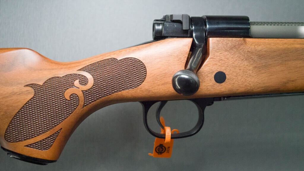 Close up view of the grip, trigger, and back of the action.