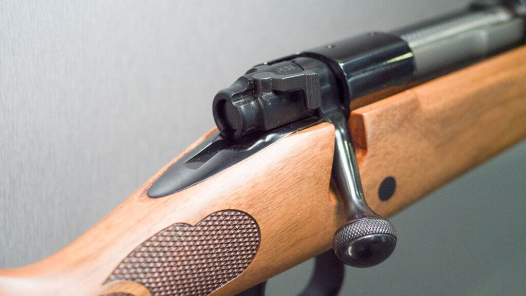 close up view of the back of the bolt showing the safety.