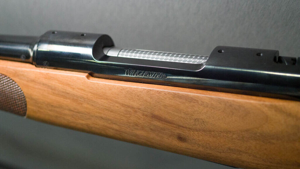 close up view of the left side of the bolt showing the makers mark.